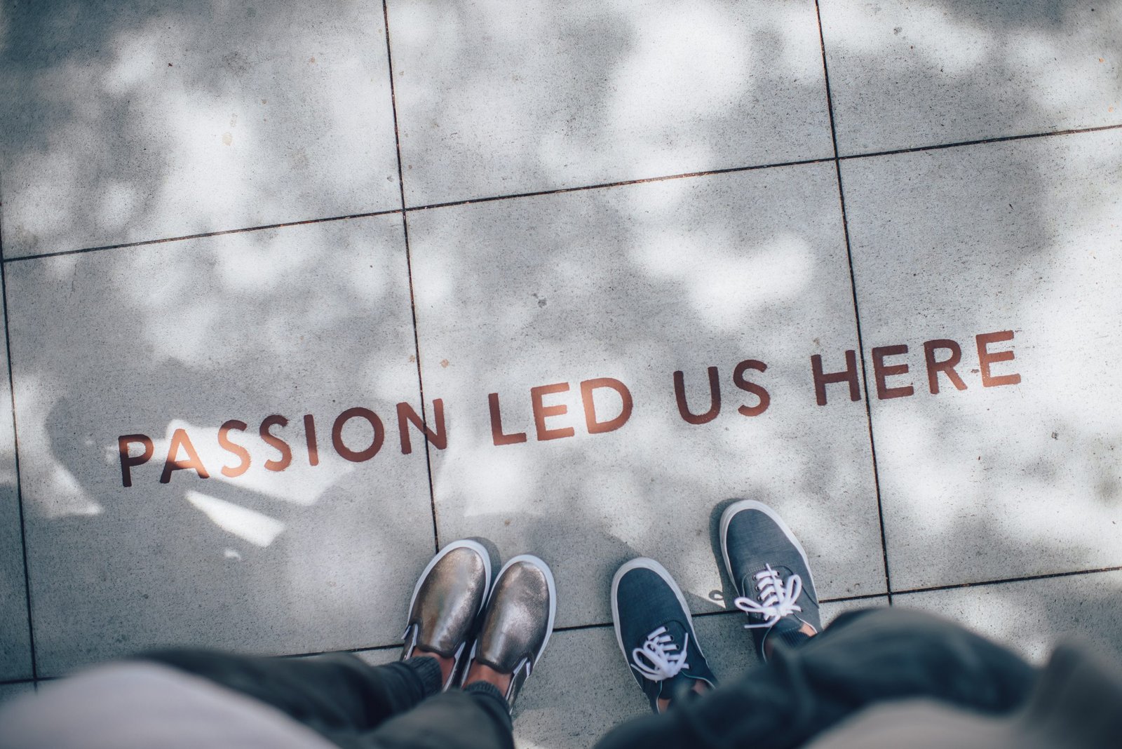 MMI-Question-Why-Medicine Pavement with two pairs of feet and the words passion led us here