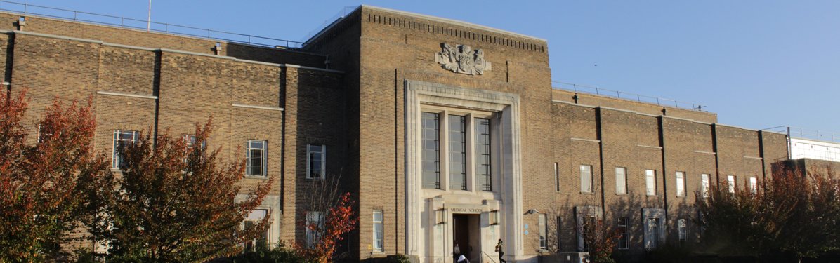 Wide shot of the medical school building at the University of Birmingham